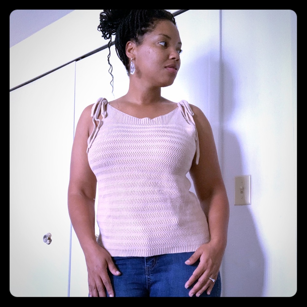 String-tie sweater top.  Tan heiringbone knit.
